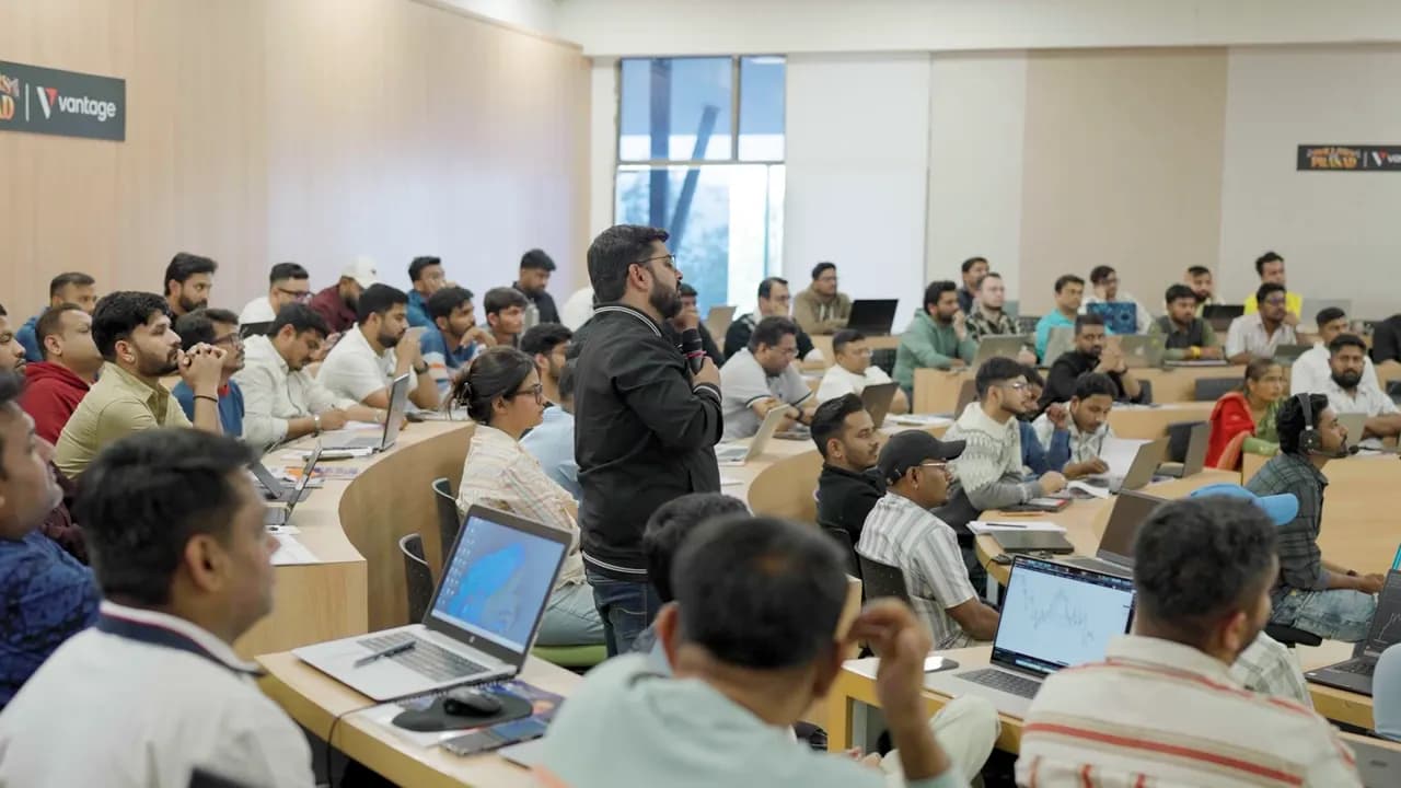 Students at laptops during an offline mentorship class